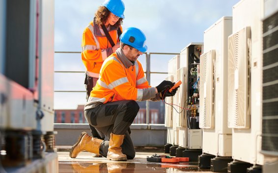 Electrician testing and diagnosing an air conditioning fault before recommending any repairs or component replacement – Ares Energy & Electricals